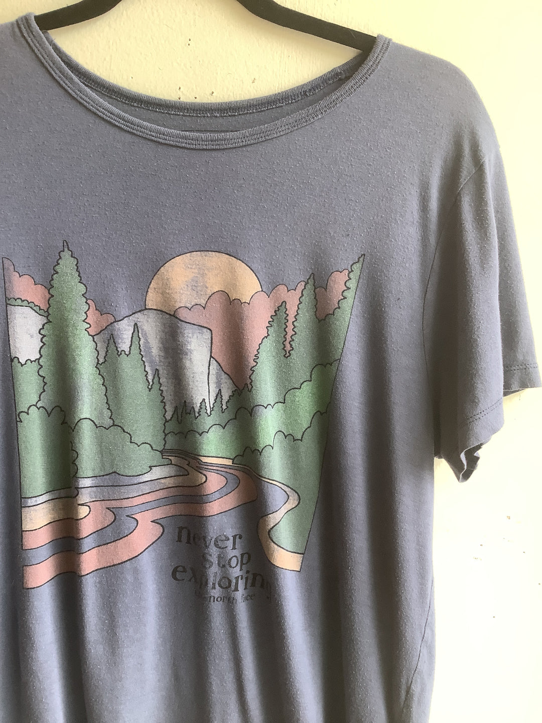 Never Stop Exploring Graphic Tee