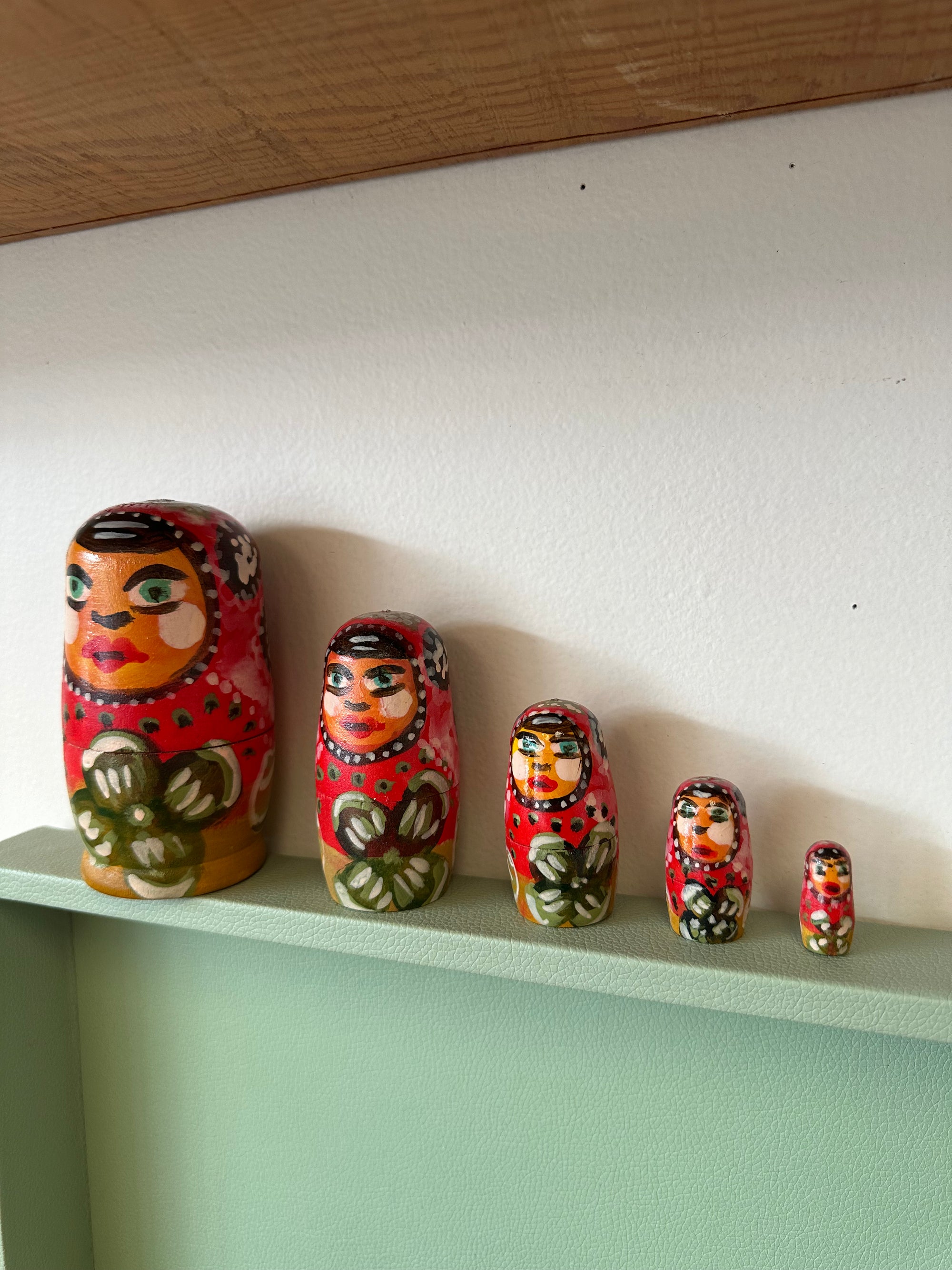 Folk Art Hand Painted Wooden Nesting Dolls Red with Green Flower